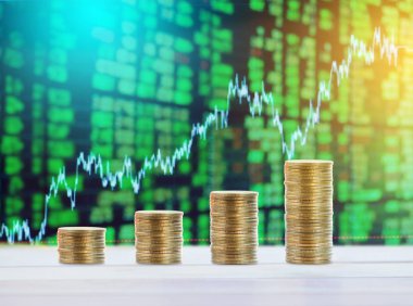 Paralar finansal hisse senedi grafikleri ile arka plan olarak yığar.