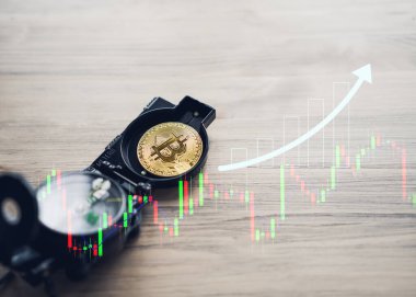 Pusula üzerine Bitcoin, Altın Bitcoin ile finansal konsept