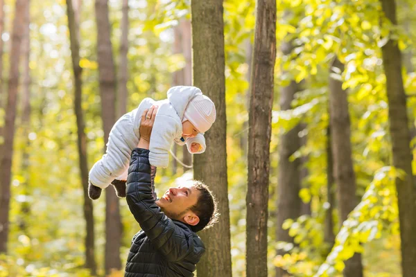 Little baby and father having fun outdoors — Stock Photo, Image