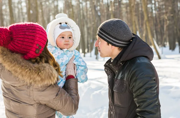 Happy family - Mother, father and child boy on a winter walk. — Stock Photo, Image