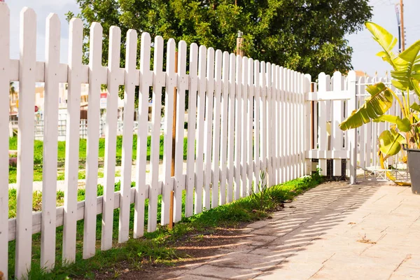 White fence in perspective