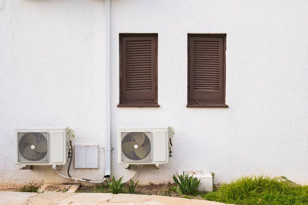 Air conditioner compressor installed on a building — Stock Photo, Image