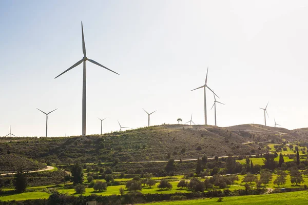 Wind turbines generating electricity with blue sky - energy conservation concept — Stock Photo, Image