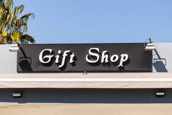 Gift shop sign on a building — Stock Photo, Image