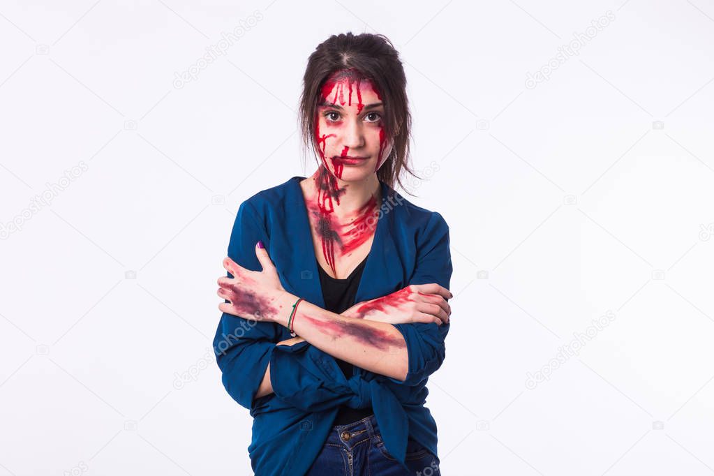 Beaten sad woman victim of domestic violence and abuse stands with bruises and wounds on her face and body. concept of domestic violence, sexual violence and cruelty