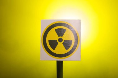 Radioactivity and sign concept - Radiation hazard sign on background