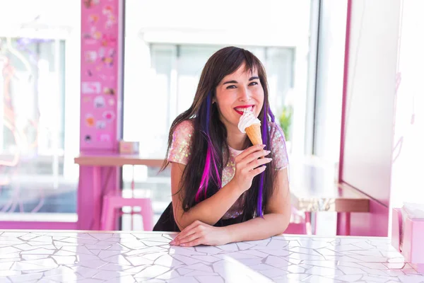 Summer, youth and dessert concept - Pretty girl enjoying an ice-cream cone in cafe — 스톡 사진