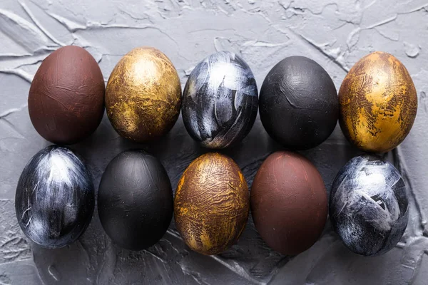Holidays, design and modern easter concept - Black and brown easter eggs style minimalism