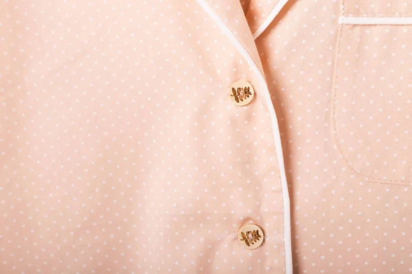 Közelkép részletek és szövet textúra egy pizsama. Háztartási viselet, hálóing, vásárlási és értékesítési koncepció. — Stock Fotó