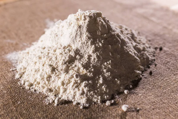 織物の背景のテクスチャ写真の白い小麦粉 — ストック写真