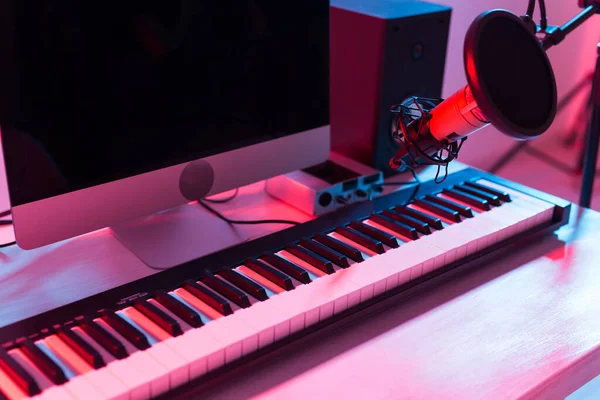 Synthesizer keyboard digital recording, home music record studio concept. Leisure and hobby concept.
