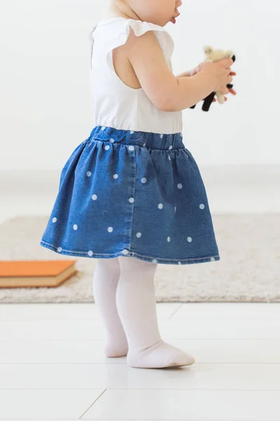 Cute baby girl playing indoors. Childhood, infant and children concept. Close-up. — Stock Photo, Image