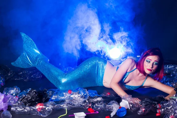 Ocean plastic pollution concept. Mermaid scared due to polluted habitat. — Stock Photo, Image