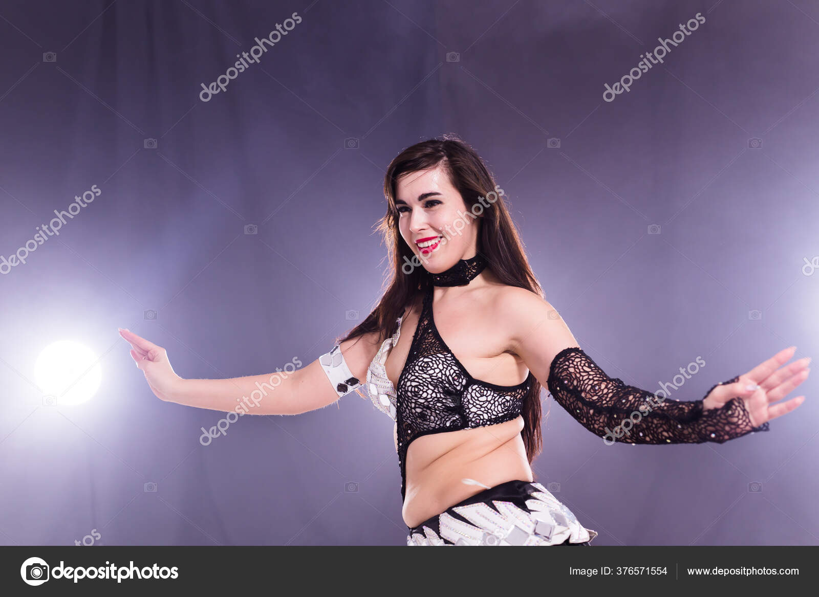 Portrait of a Woman in Oriental Costume Performing Belly Dance. Tribal  Fusion Dance Concept. Stock Photo - Image of dancer, arms: 183602590