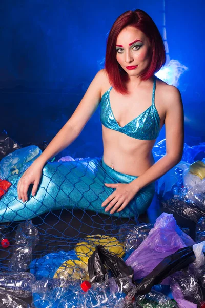 Sea plastic pollution concept. Mermaid in the ocean. Plastic is everywhere. Environmental protection. — Stock Photo, Image
