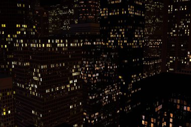 uzun boylu evler ile bir şehrin gece manzarası