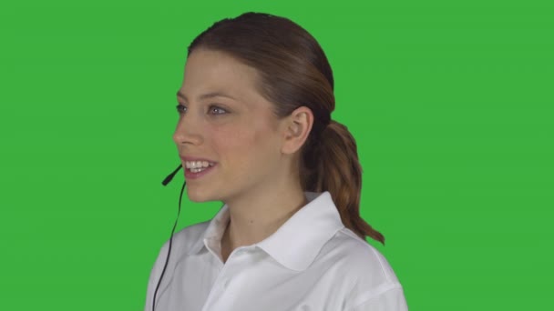Жіночий технічна підтримка обробляє виклику (зелений ключ) — стокове відео