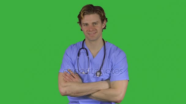 Cheerful professional male doctor (Green Key) — Stock Video