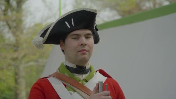 Revolutionary War era British troop looks at camera — Stock Video