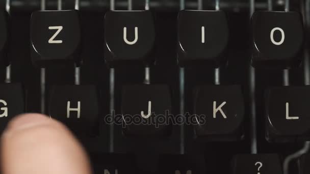 Close up fingers typing on typewriter. — Stock Video