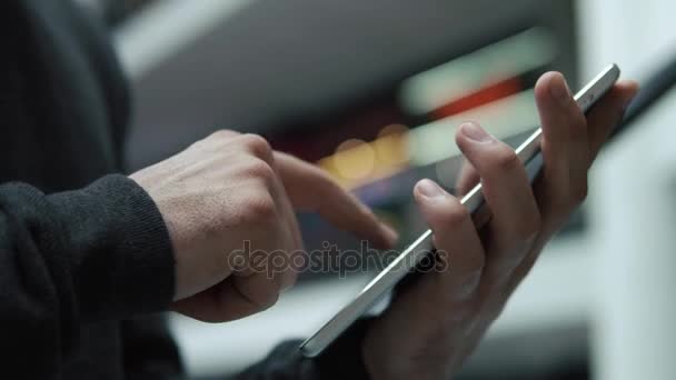 Close-up of mans hands typing something on the tablet — Stock Video