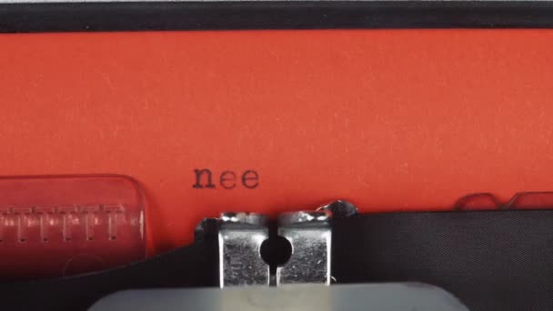 Need job - Typed on a old vintage typewriter. Printed on red paper. The red paper is inserted into the typewriter — Stock Video