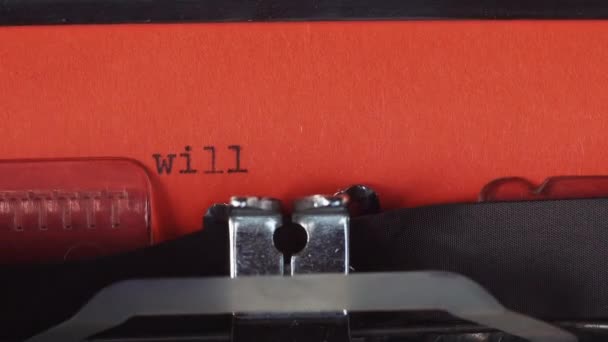 Will you marry me - Typed on a old vintage typewriter. Printed on red paper. The red paper is inserted into the typewriter — Stock Video