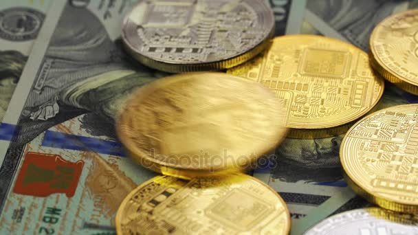 Gold and silver bitcoins and dollars, close-up — Stock Video