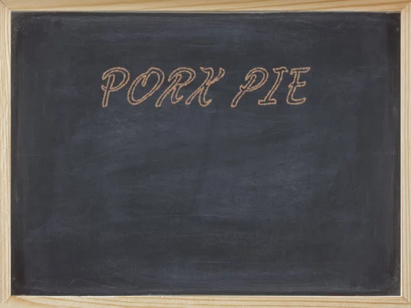Pork Pie mięsa napisane na czerwono na tablicy — Zdjęcie stockowe