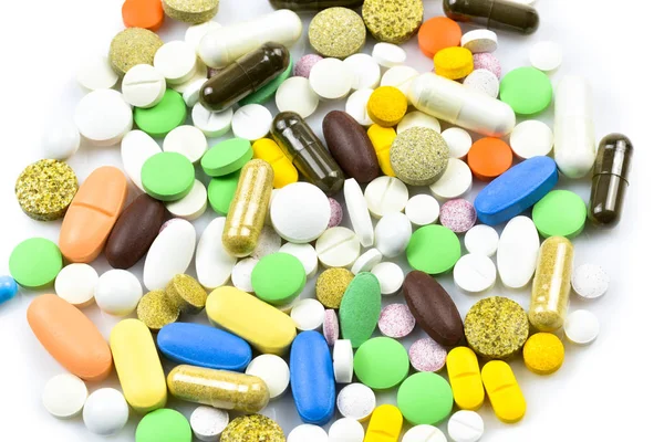 Hromada tablety a kapsle — Stock fotografie