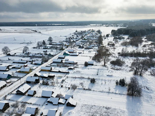 Winter rural landscape. Village coverd by snow. Aerial view — Stock Photo, Image