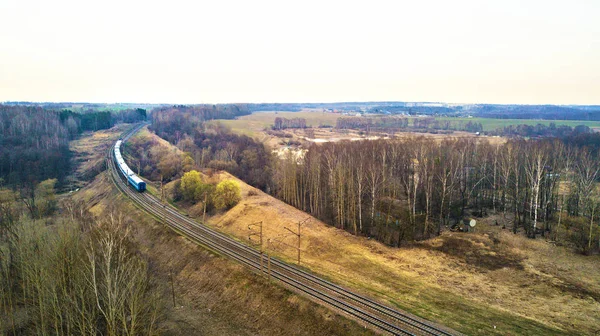 Train passing to a distance at the double line railway — Stock Photo, Image