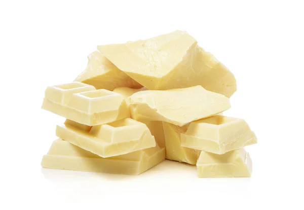 Kousky bílé čokolády a kakaové máslo — Stock fotografie