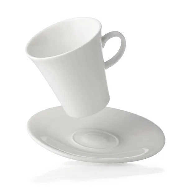 Taza de café blanco vacío y platillo de primer plano —  Fotos de Stock