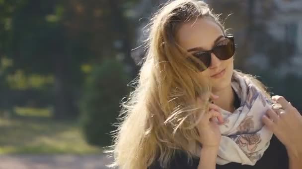 Young Blonde Girl in Sunglasses Talking by Phone — Stock Video