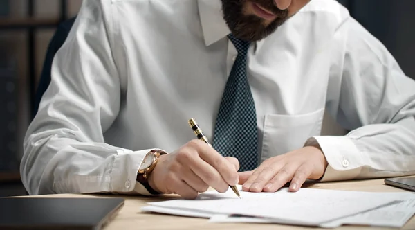 Businessman writing document close-up — Stock Photo, Image