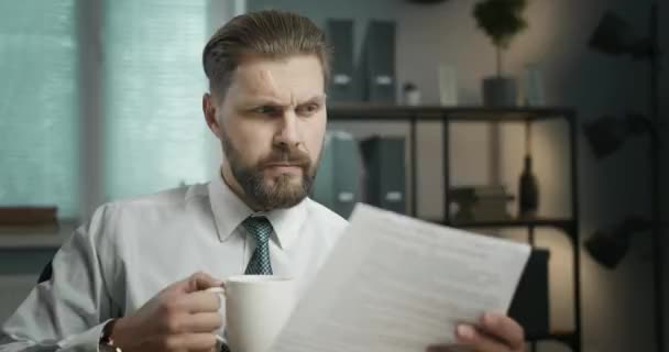 Businessman Checking Documents in Office — Stock Video