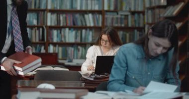 Male in Reading Hall in Library