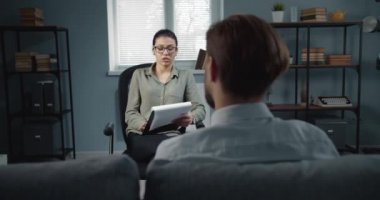 Psychologist providing professional consultation for patient