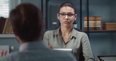 Psychologist discussing with male patient his excitements