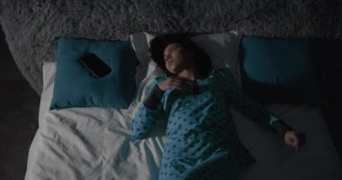 Woman Suffering Insomnia at Night