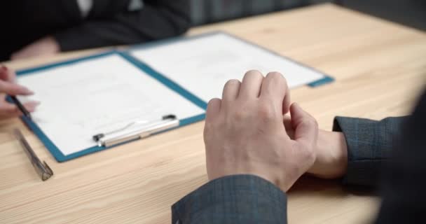 Close up nervous mans hands during job interview — Αρχείο Βίντεο