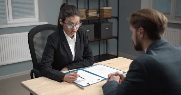 Female manager checking resume of new candidate — 图库视频影像