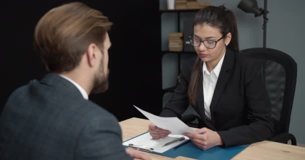 Female manager giving negative result about job interview