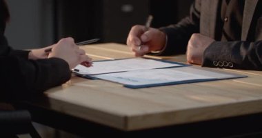 Close up of female manager shaking hands with male candidate