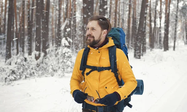 Backpacker putting off sunglasses portrait