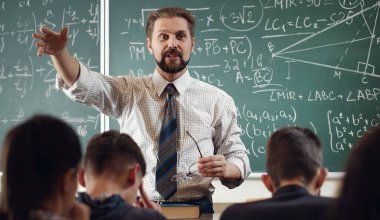 Enthusiastic mathematician explaining subject