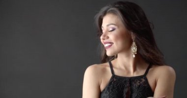 Portrait of fashion model with bright gloss makeup