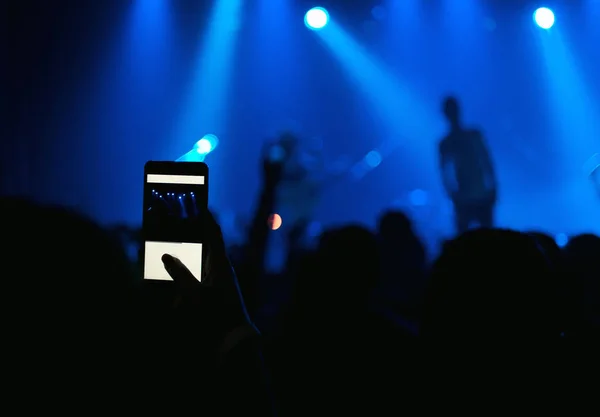 People holding their smartphone and photographing concert — Stock Photo, Image