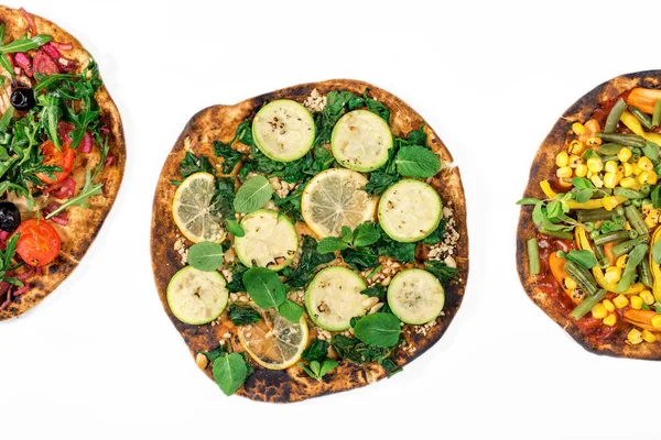 Close up different vegan pizza on white background — Stock Photo, Image